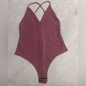 MAUVE V NECK CROSS BACK SNAP BODYSUIT